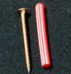 Red wall plug and screw.